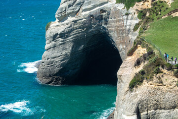 Naklejka premium Dramatic Coastal Cave and Turquoise Waters