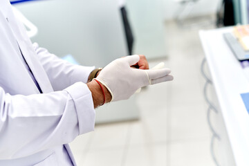 Dentist preparing in sterile environment