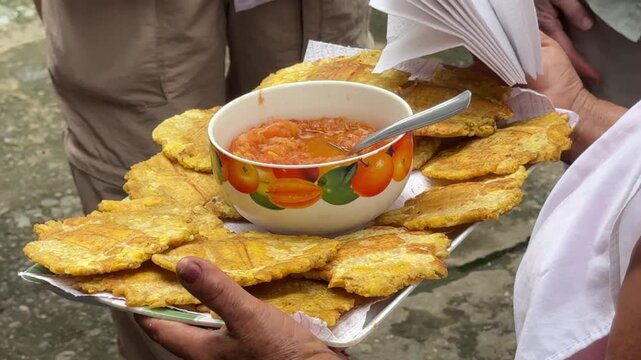 A Plate of Patacones with Hogao (Colombian Tomato and Green Onion Creole Sauce) 