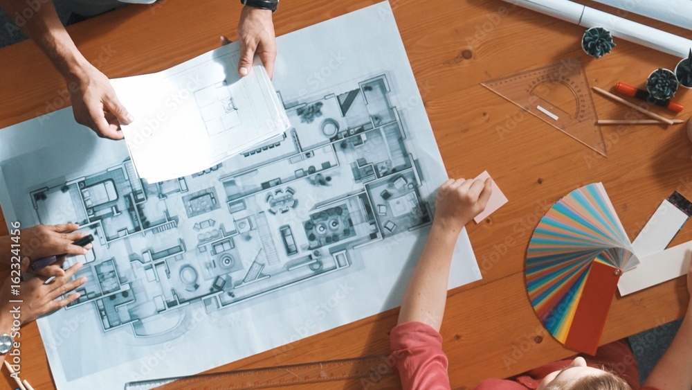 Poster top down view of manager looking at document while team planing building. aerial view of skilled arc