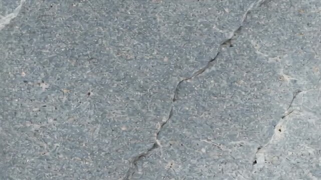 Gray stone surface with veins