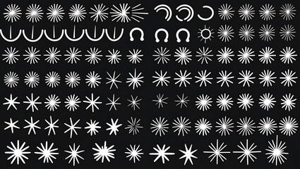 White starbursts and horseshoe shapes on black background image