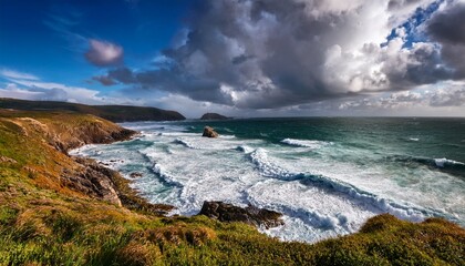 stunning coastal landscape with gentle waves and beautiful clouds during daylight on a serene beach