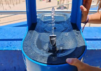 drinking  some water for refreshing