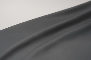 Gunmetal Grey Ripstop Material – Smooth and Taut with Soft Ambient Light