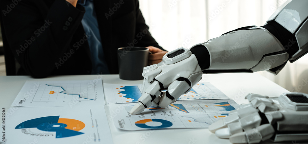 Poster a robotic arm analyzes business charts and graphs while a person sips coffee in a modern office. thi