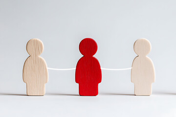 A central figure connects two others, symbolizing coordination and networking within a team, all crafted from simple wooden forms.