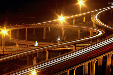 Vibrant night traffic light trails at Qing Interchange in Taichung Taiwan, captured in summer 2012,...