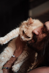 bearded man with cat, long hair