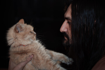 bearded man with cat, long hair