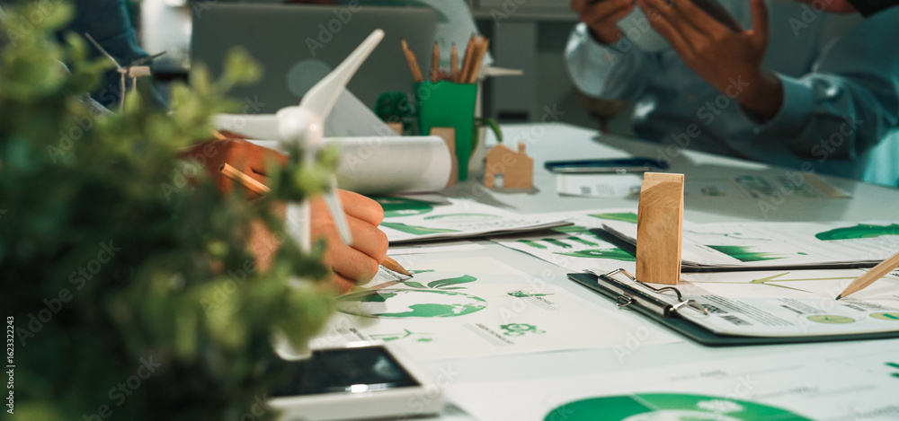 Aufkleber professionals in a collaborative workspace focus on sustainable development projects. green technolo