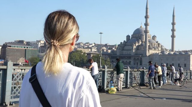A girl walks around the sights of Istanbul