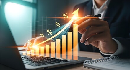 Rising bar graph with percentage sign and upward arrow, man analyzing data on laptop