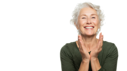 Happy senior woman smiling with hands near face, joyful expression, isolated in white background.