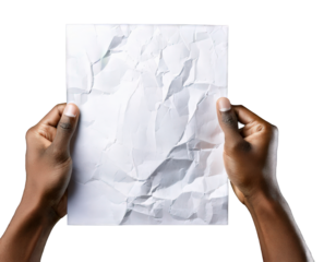 Hands holding crumpled white paper