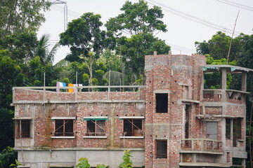 Newly constructed duplex house, which is a residential building designed with two separate living...