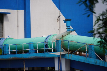 water pumping station or water treatment plant, transferring water to storage for a city corporation
