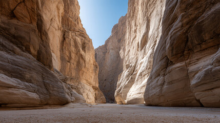 Majestic Canyon Vista: Expansive Walls, Sunlit Center, and Dramatic Geological Formations, Awe-Inspiring Natural Wonder, Perfect for Adventure Seekers and Scenic Explorations
