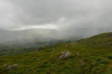 mountain landscape with fog, green ,grass