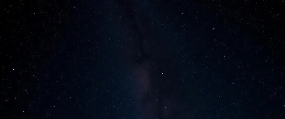 Fototapeta premium Vast, inky black sky brimming with countless stars, night sky, astronomy