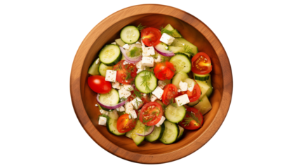 Fresh Greek salad bursting with vibrant cucumber, tomato, feta, and herbs in a rustic wooden bowl