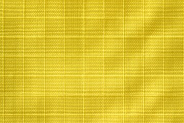 Macro Abstract of Lemon Yellow Ripstop Cloth with Even Tone and Grid Square Emphasis
