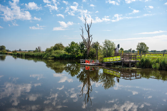 Natural reflections at the River Yser Ijzer in Diksmuide, West Flanders, Belgium