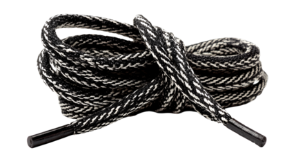 Black and white shoelaces rolled up close up detail shot