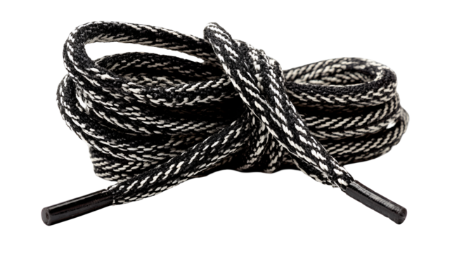 Black and white shoelaces rolled up close up detail shot