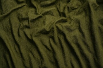 Army Green Ripstop Fabric with Deep Creases and Natural Shade Gradients