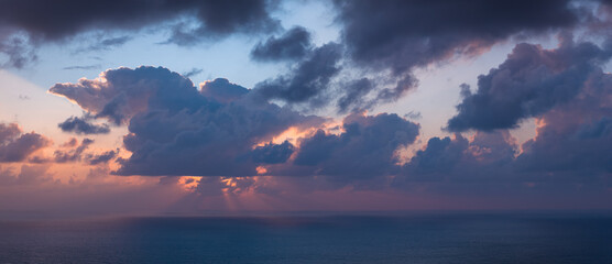 Sunset clouds over the Cantabrian Sea from the town of Cóbreces in the municipality of Alfoz de Loredo. Cóbreces, Cantabria, Spain, Europe