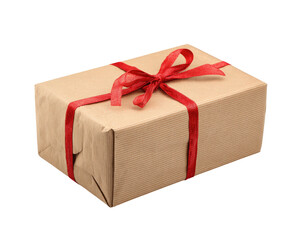 Obraz premium A rectangular, light brown wrapped gift box, tied with a red ribbon