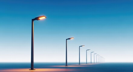 A row of streetlights receding into the distance under a clear blue sky