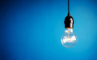 Bright idea shining with innovation and inspiration against a vibrant blue backdrop for creative solutions and brainstorming visuals