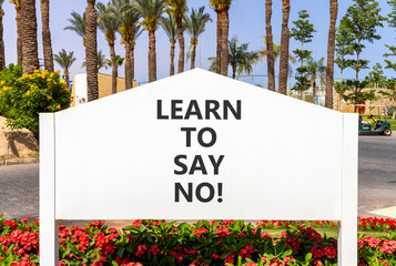 Learn to say no symbol. Concept words phrase Learn to say no on beautiful big white road sign....