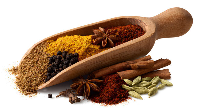 Garam masala mix in wooden scoop isolated on a white background