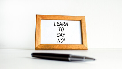 Learn to say no symbol. Concept words phrase Learn to say no on beautiful wooden picture frame....