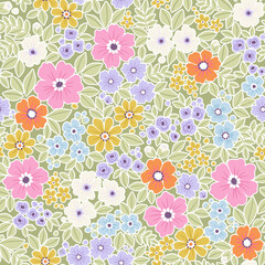 Vector romantic liberty floral seamless pattern. Flowers field floral pattern in pale pastel colors blue, pink, yellow, lilac. Beautiful digital textile seamless floral, green background. Stock print
