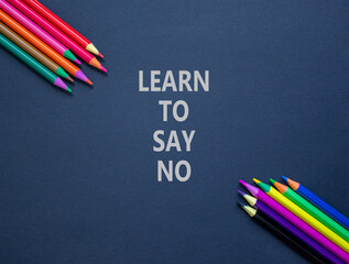Learn to say no symbol. Concept words phrase Learn to say no on beautiful black paper. Colored...