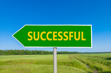 Successful symbol. Concept word Successful on beautiful green road sign. Beautiful blue sky green grass and forest peaceful nature background. Business successful concept. Copy space.