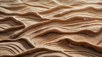 Textured sand dunes with layered formations and earthy tones. Natural landscape, desert scenery, geological features. The landscape of sand formations and textures.