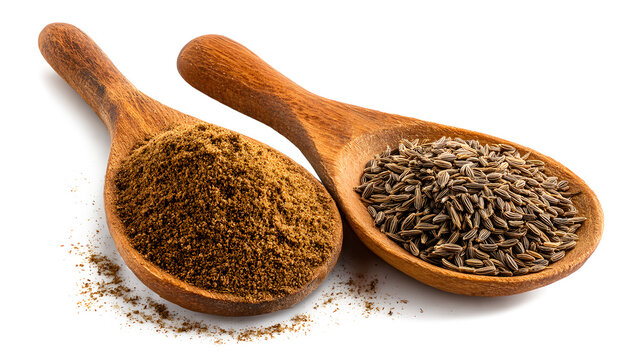 Ground cumin in a spoon and whole cumin isolated on a white background