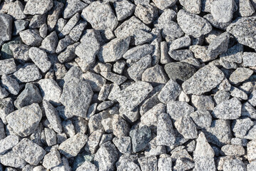 Granite gravel in bright sunlight.