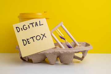 Technology concept - words of digital detox digital gadgets. Concept of social media addiction....