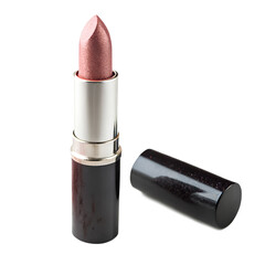 Photo of a shimmering rose gold lipstick with its cap lying next to it, isolated on transparent background