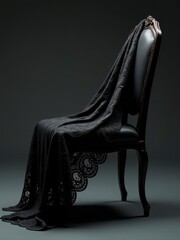 A black lace dress elegantly draped over a wooden chair against a dark background. death, funeral