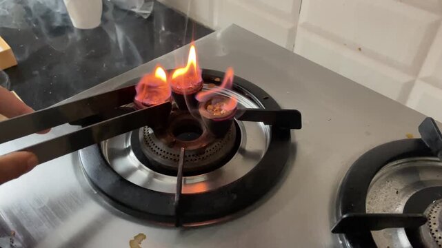 Burning Phool Sambrani Handcrafted Havan Cups on Gas Stove  Traditional Aromatic Ritual