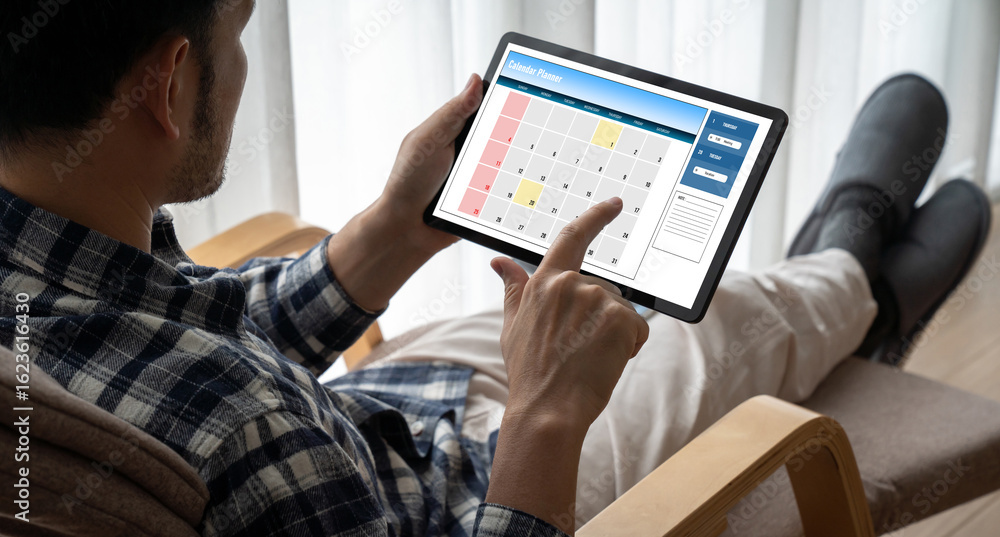 Poster calendar on computer software application for modish schedule planning for personal organizer and on