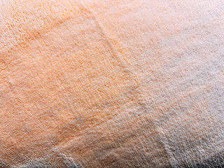 Angled View of a Soft Orange Terrycloth Fabric