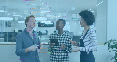 Collaborating IT professionals analyzing code on glass partition in office with tablet marker pen